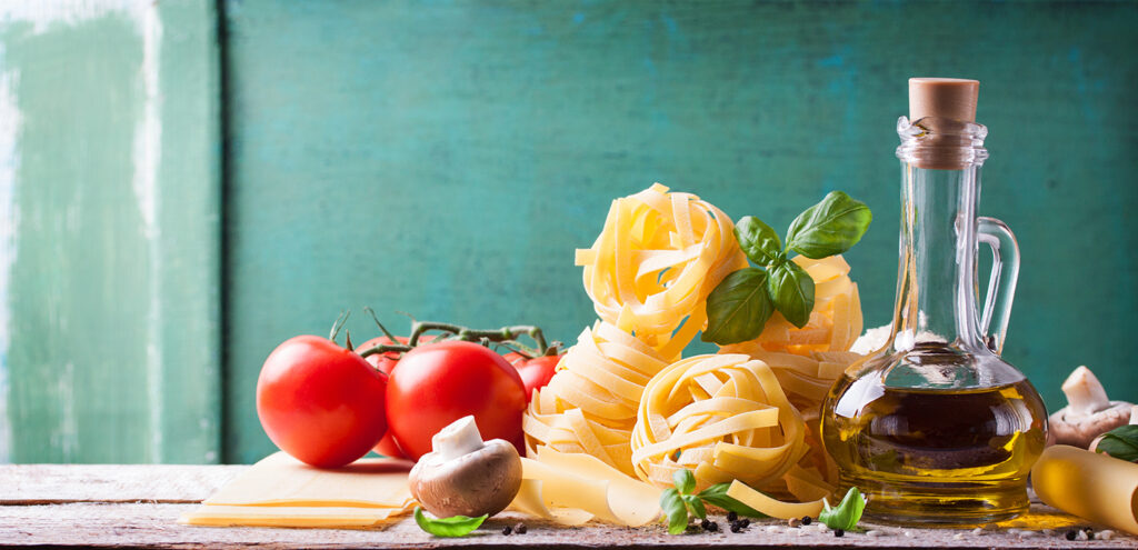 header image for pumps for food industry - table with vegetables, oil in glas and pasta